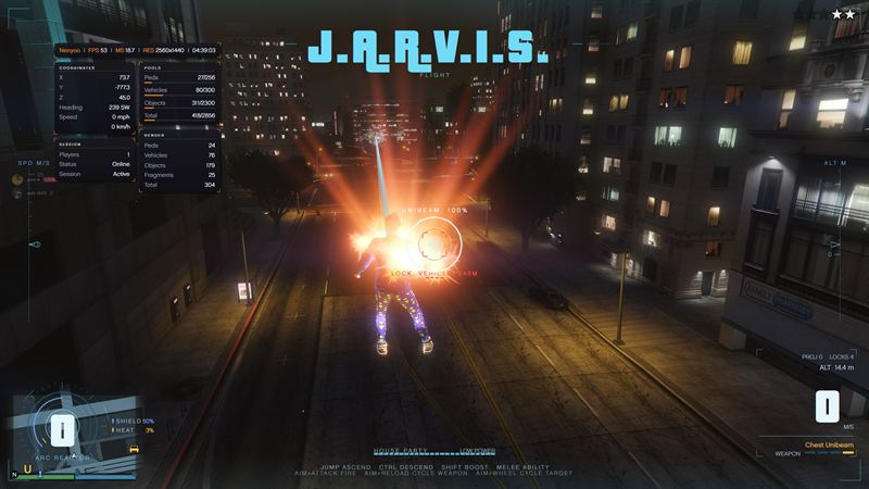 The J.A.R.V.I.S. flight suit firing its chest unibeam on a night street, with shield and heat gauges